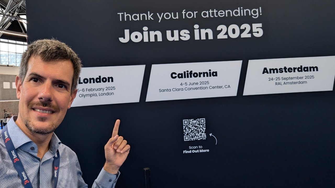 Luca Berton pointing at the TechEx Join us in 2025 wall listing London, California and Amsterdam dates