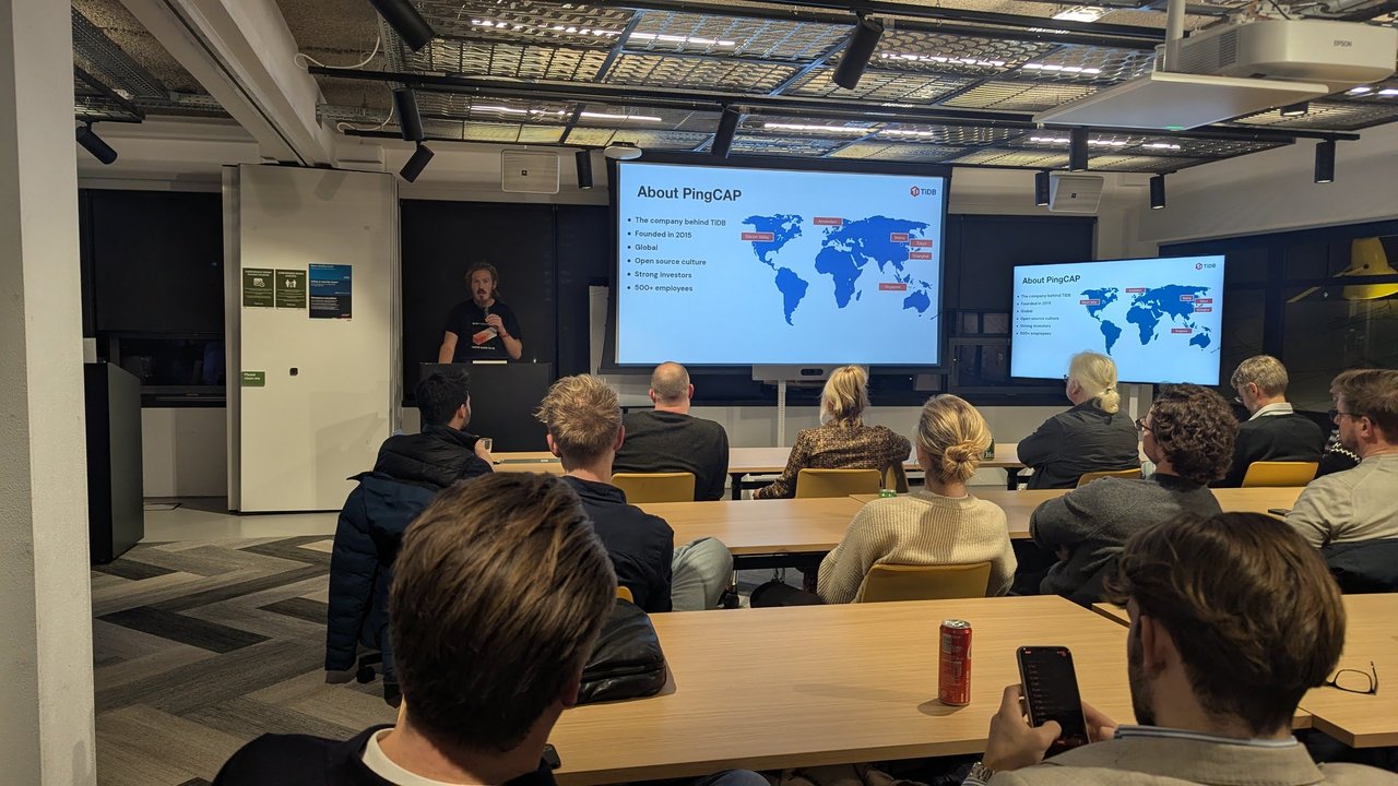 The About PingCAP slide: the company behind TiDB, founded in 2015, global, open source culture, strong investors, 500+ employees, with a world map marking offices including Amsterdam