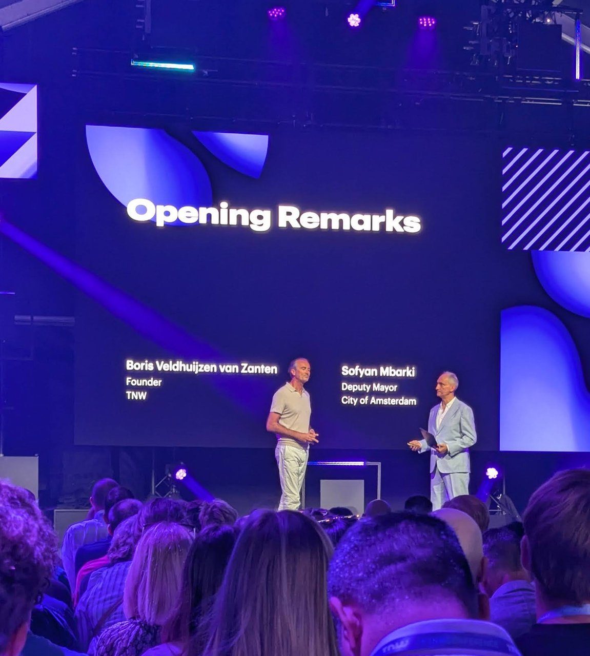 TNW Conference 2025 PURPLE stage with an Opening Remarks slide naming Boris Veldhuijzen van Zanten, Founder of TNW, and Sofyan Mbarki, Deputy Mayor of the City of Amsterdam, standing on stage