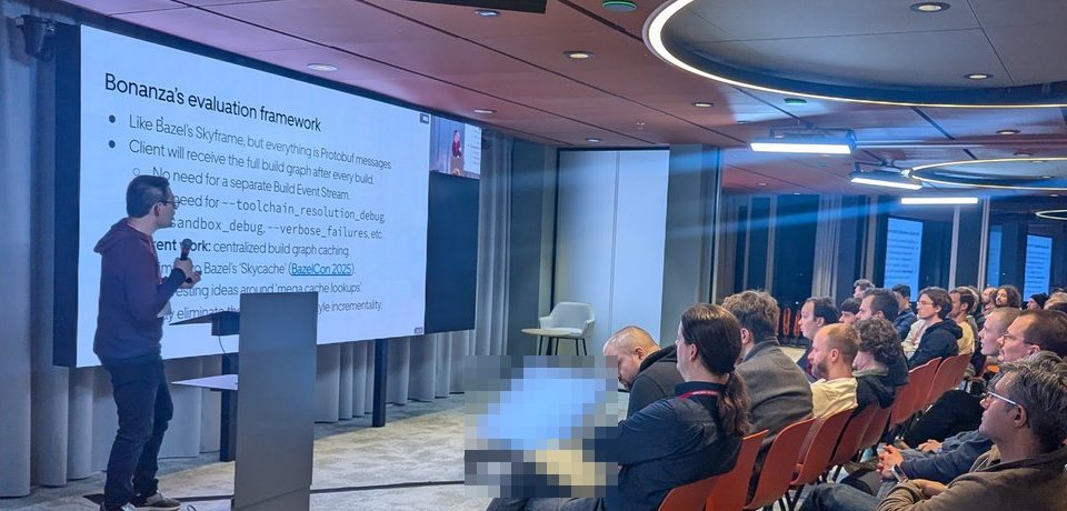 Ed Schouten presenting Bonanza's evaluation framework slide: like Bazel's Skyframe but everything is Protobuf messages, the client receives the full build graph after every build