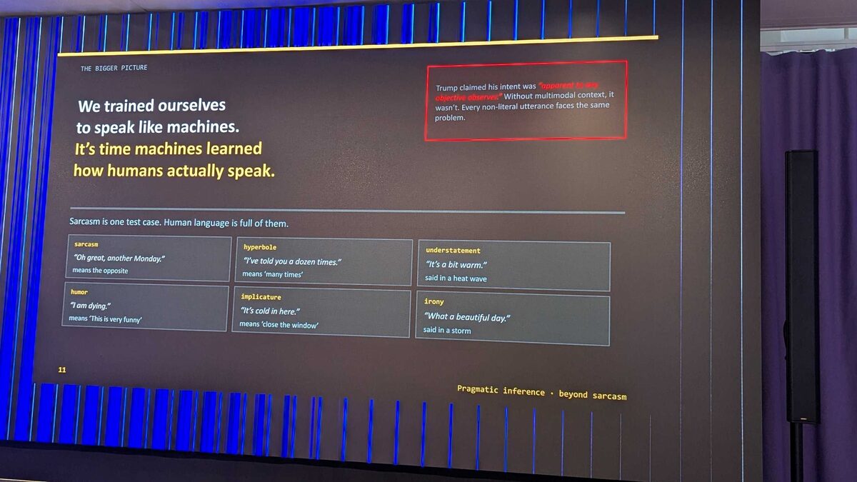Matt presenting pragmatic inference — sarcasm, hyperbole, understatement, humor, implicature, irony — "We trained ourselves to speak like machines. It's time machines learned how humans actually speak."