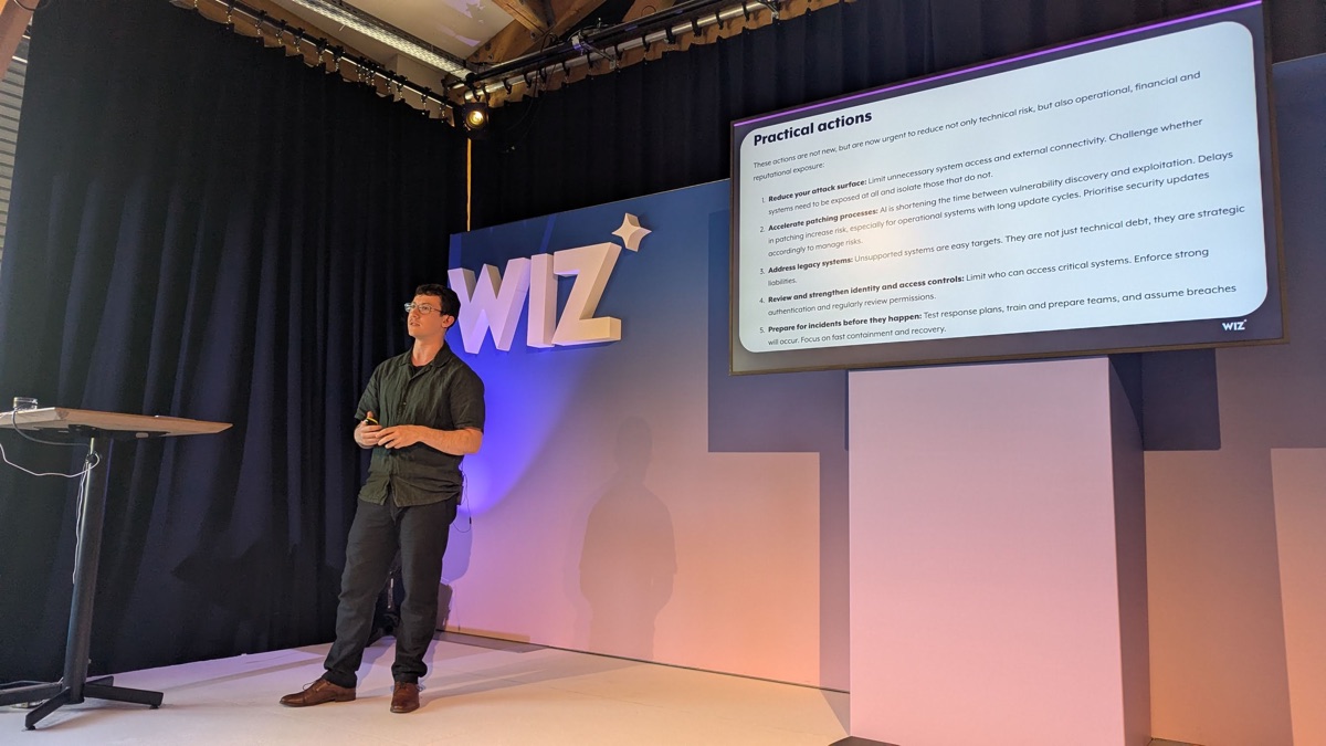 Wiz threat research speaker presenting practical actions for AI-era cloud risk at Wiz Club Amsterdam 2026