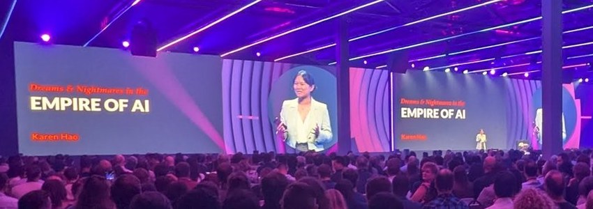 Main stage at World Summit AI 2025 with the slide Dreams and Nightmares in the Empire of AI, Karen Hao, and the speaker on the big screen