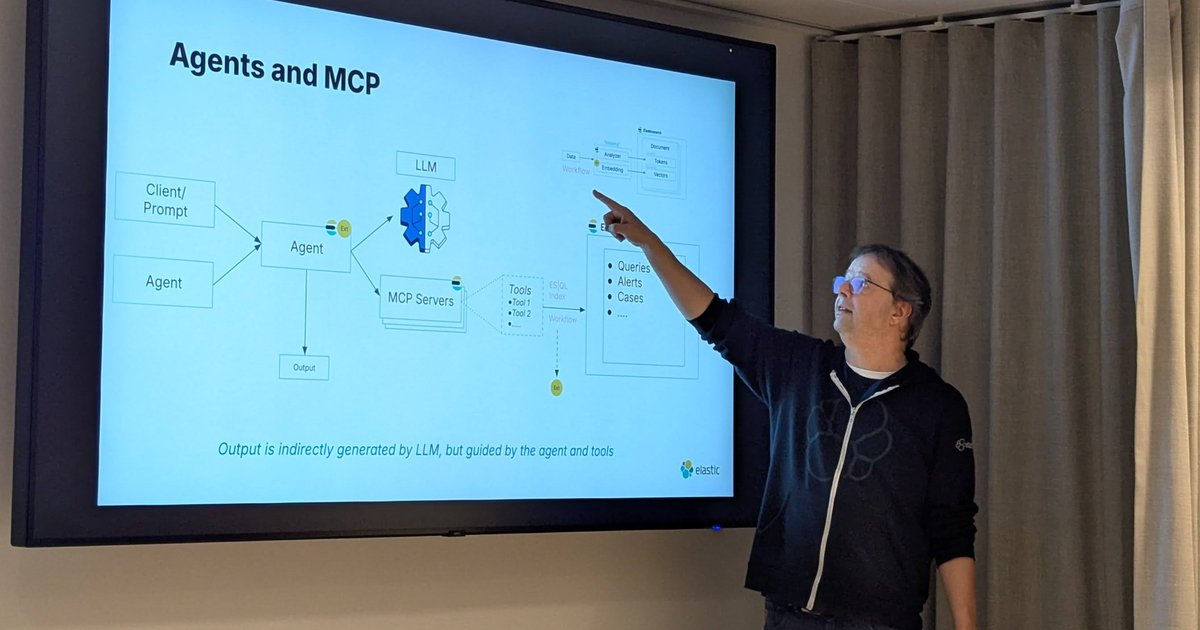 Hans Heerooms of Elastic pointing at an Agents and MCP architecture slide showing an agent, an LLM, MCP servers, tools and Elasticsearch