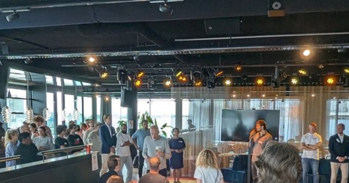 The Wolf Club at The Flow in Amsterdam Houthavens during AI Salon, with the audience gathered around the stage