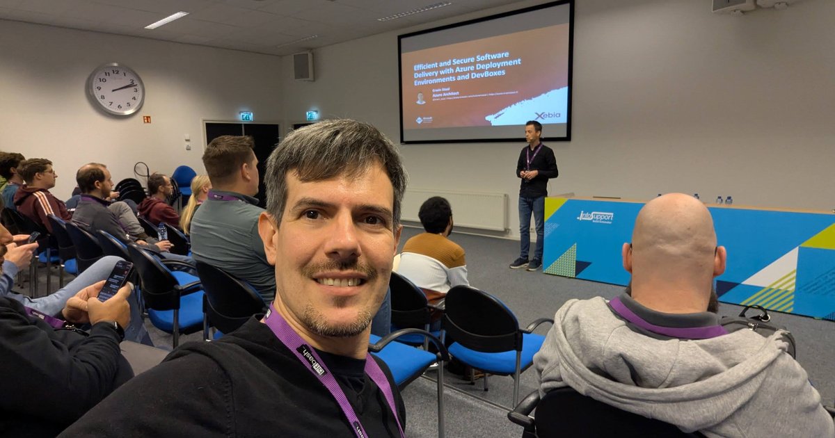 Luca Berton in the audience at BitBash 2025 in Veenendaal, with the Azure Deployment Environments and DevBoxes title slide on screen behind him
