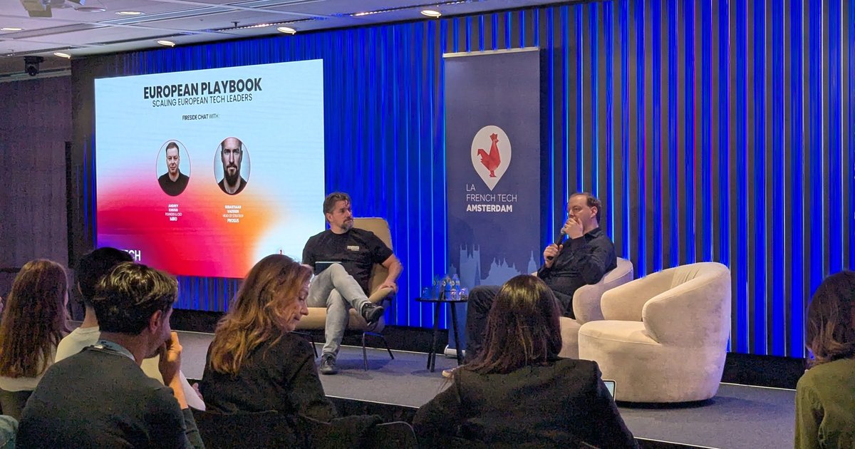 Fireside chat on stage at the European Playbook event at AI House Amsterdam, with the La French Tech Amsterdam banner