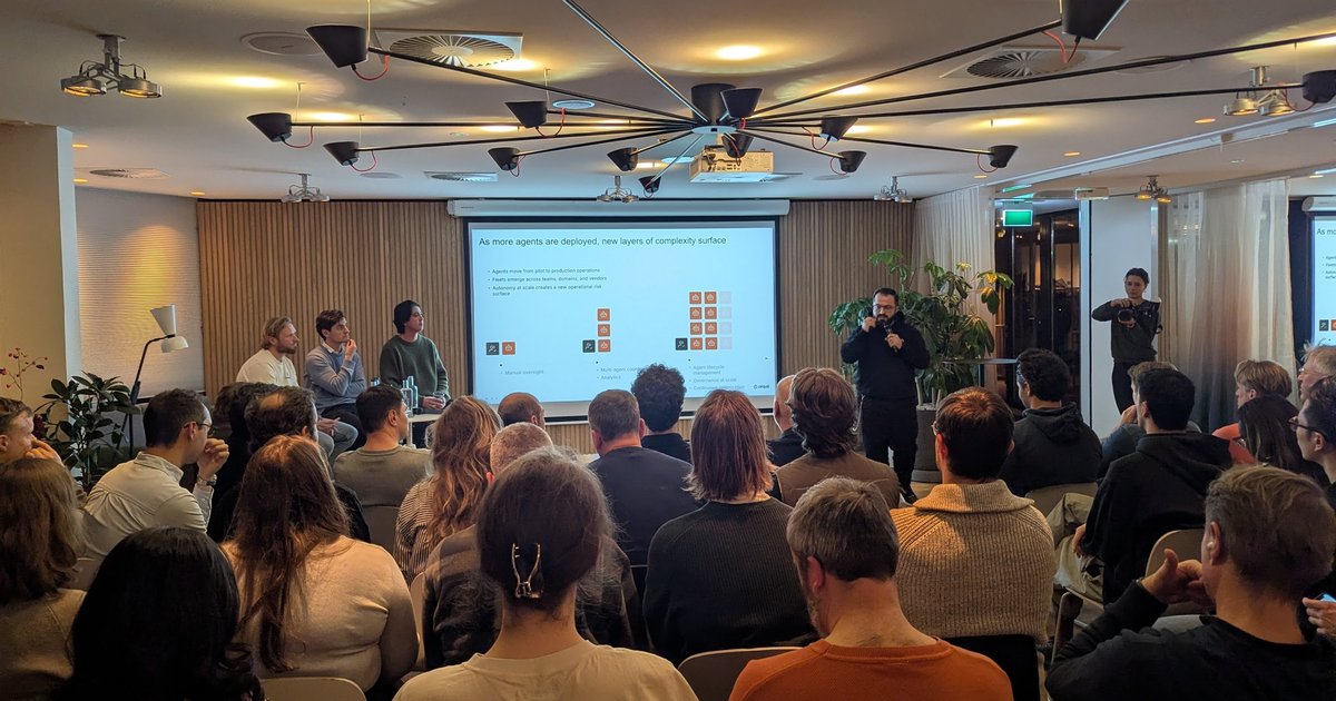 Sohrab Hosseini of Orq.ai presenting a slide on agent fleets to a full room at Zoku Amsterdam