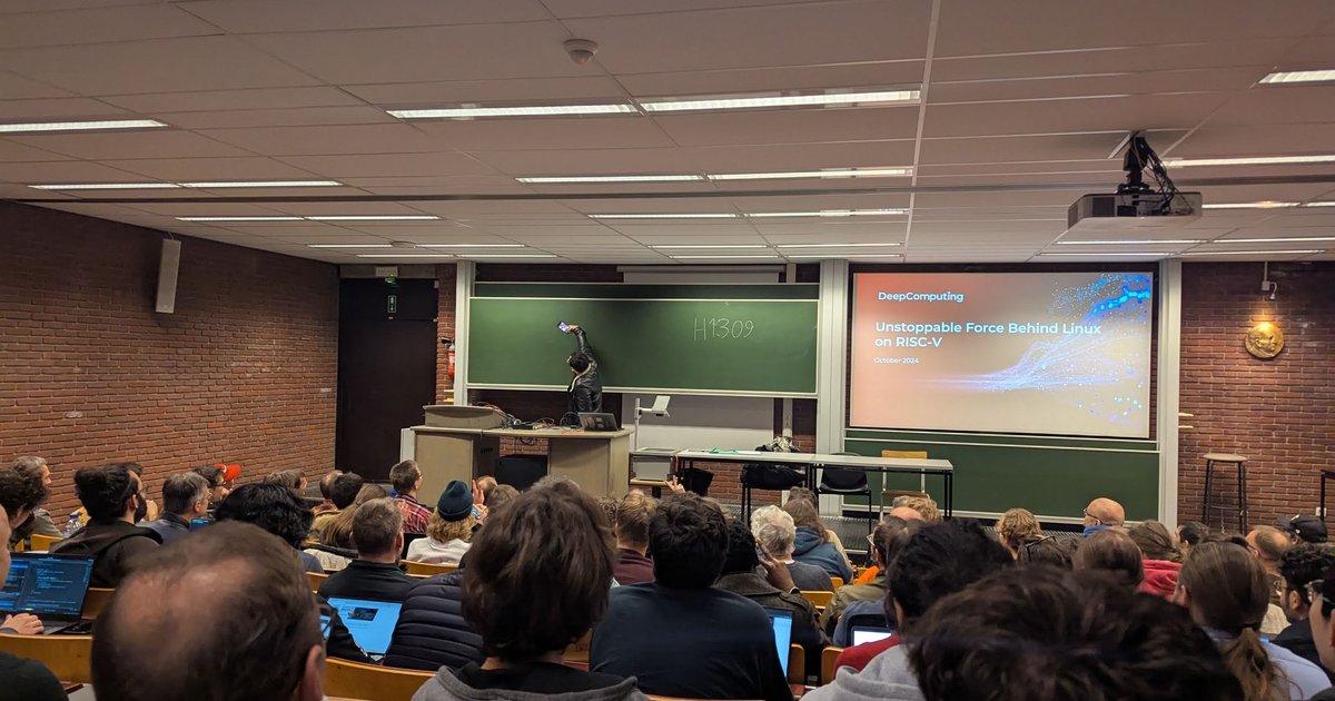DeepComputing's Unstoppable Force Behind Linux on RISC-V title slide in room H.1309 at FOSDEM 2025, seen from the back of a full room