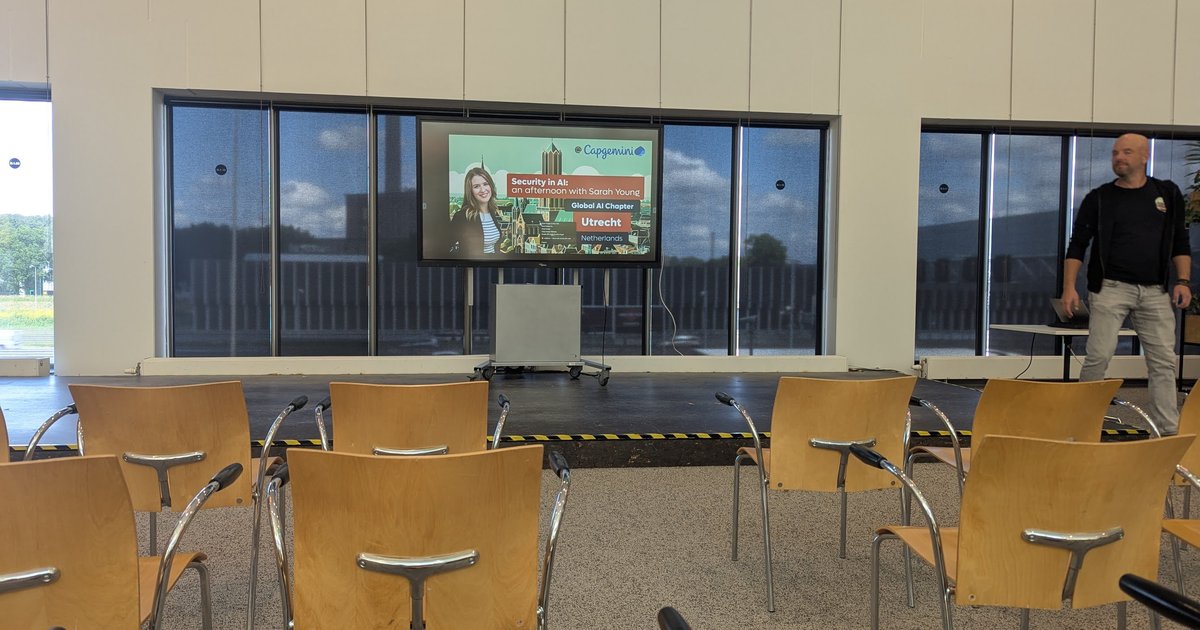 Event slide for Security in AI: an afternoon with Sarah Young, Global AI Chapter Utrecht, on a screen at Capgemini Utrecht