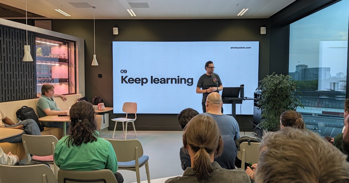 Ainsley Clark presenting on staying passionate in tech in the age of AI at the Go Amsterdam meetup, JetBrains office