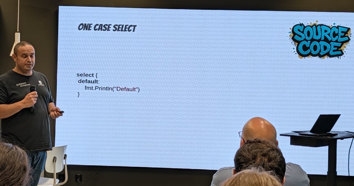 Jesús Espino presenting on the Go select statement at the Go Amsterdam meetup, JetBrains office