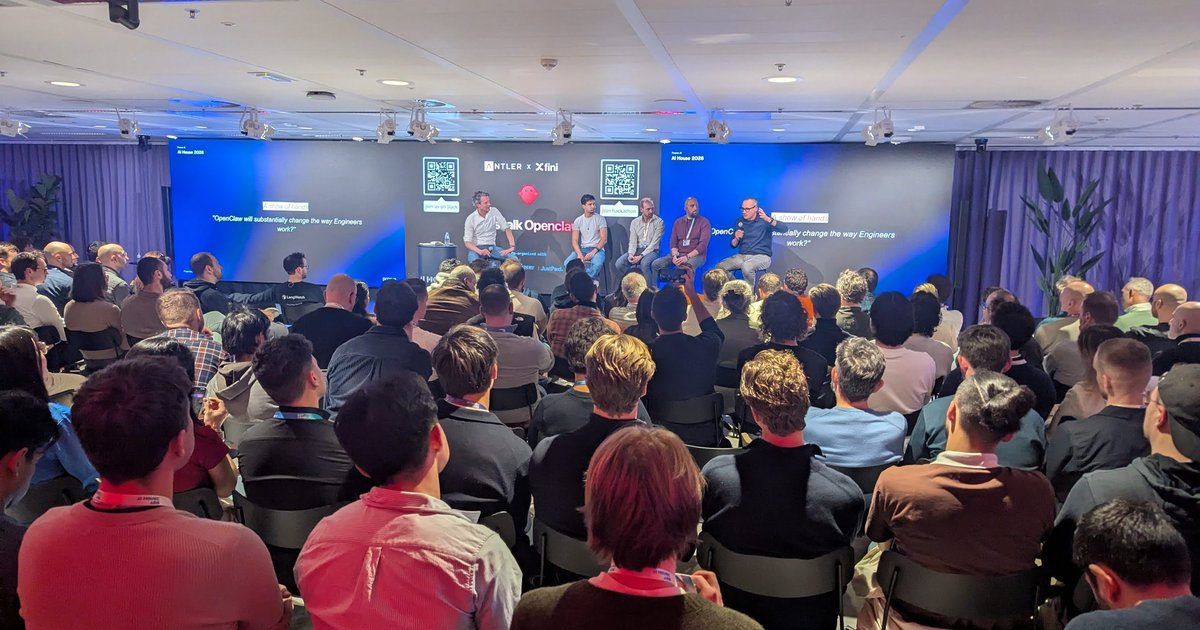 Five-person panel on stage at the OpenClaw Builders Community meetup at AI House Amsterdam, in front of a packed audience