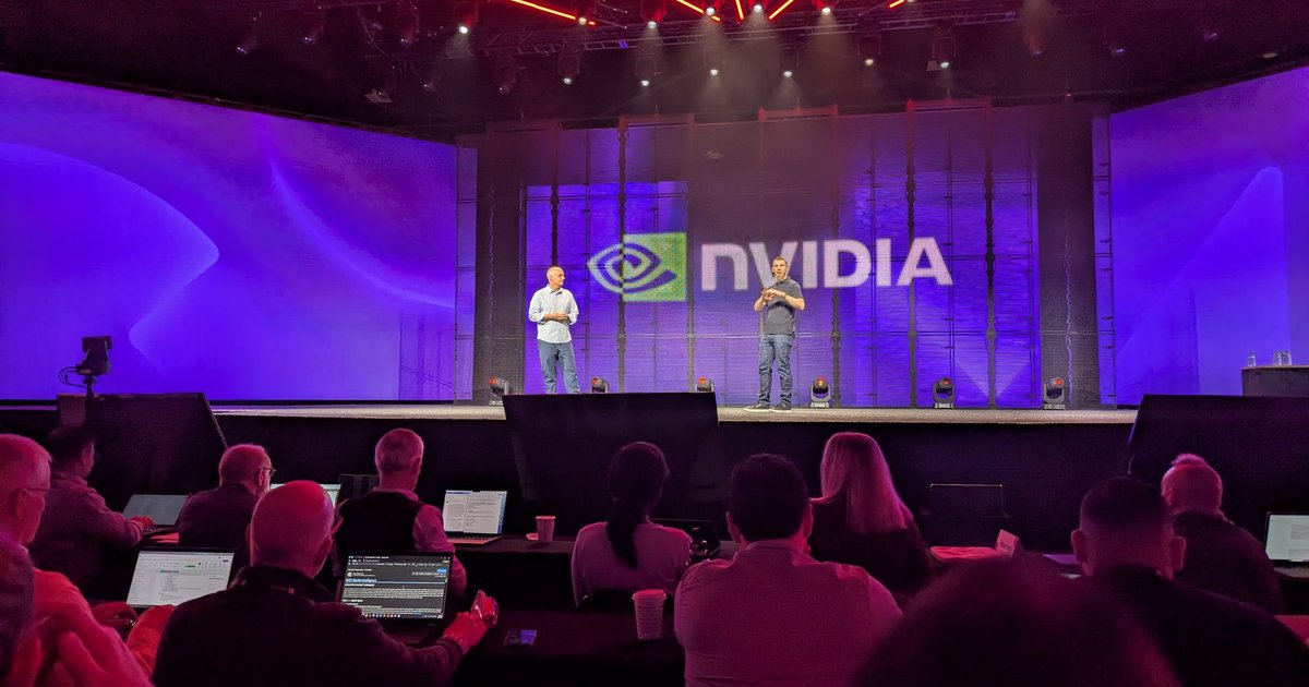 Two speakers on stage in front of an NVIDIA logo during the Red Hat Summit 2026 keynote