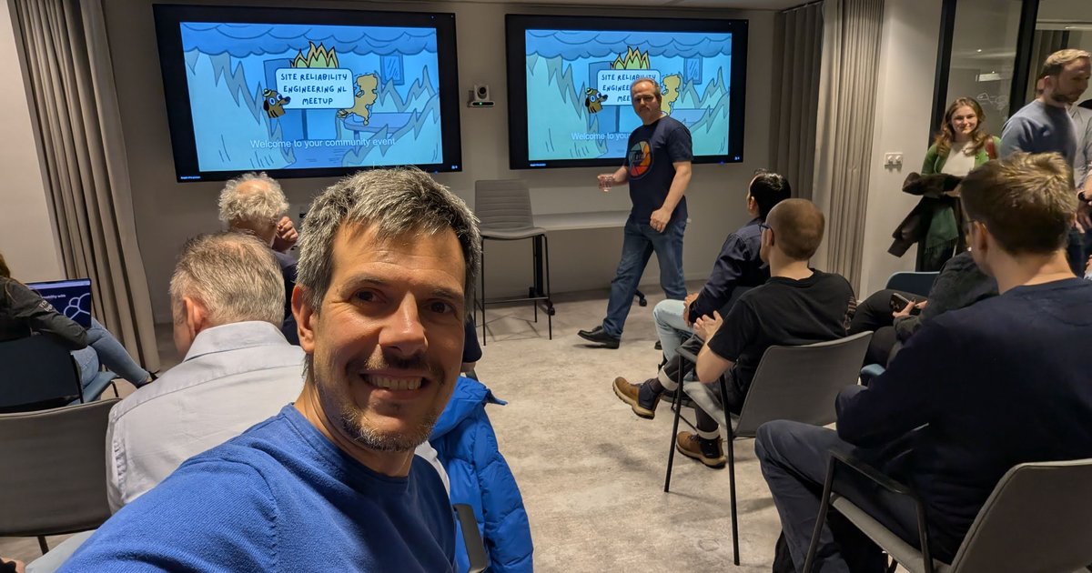 Luca Berton at the SRE NL meetup at Elastic Amsterdam in front of the Welcome to your community event slide