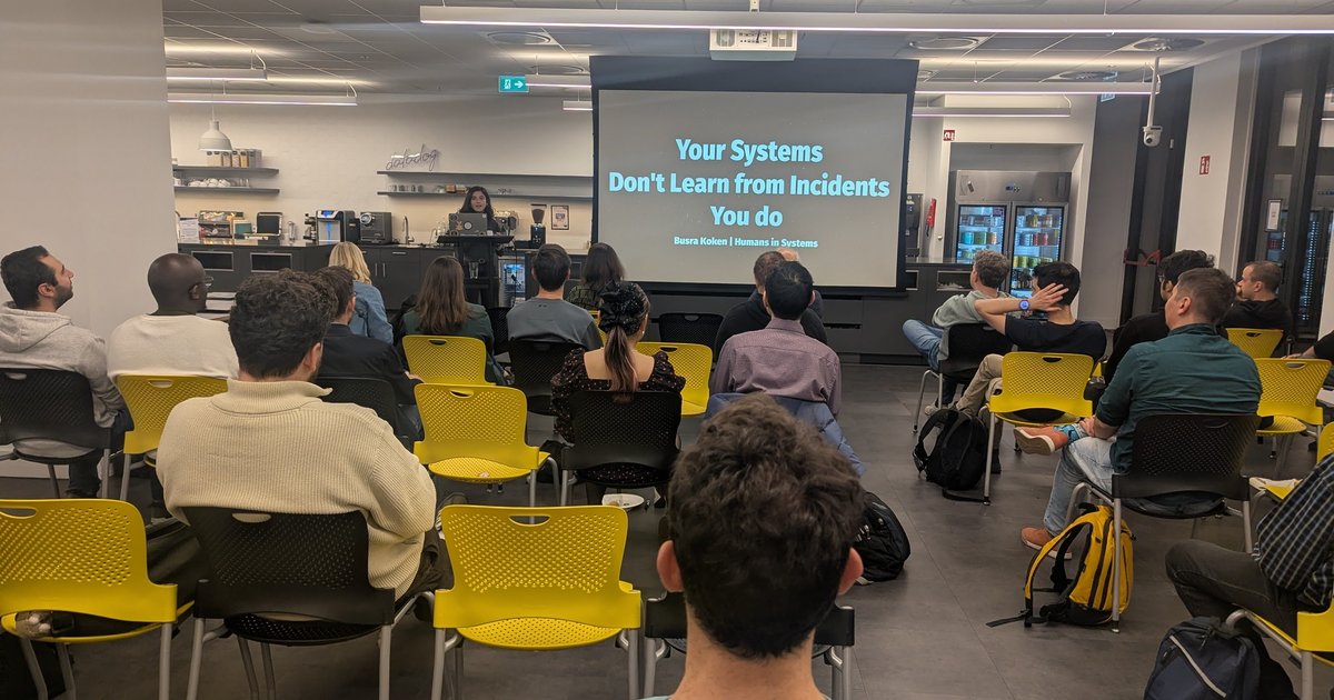 Busra Koken's title slide, Your Systems Don't Learn from Incidents, You do, at the SRE NL meetup in Amsterdam
